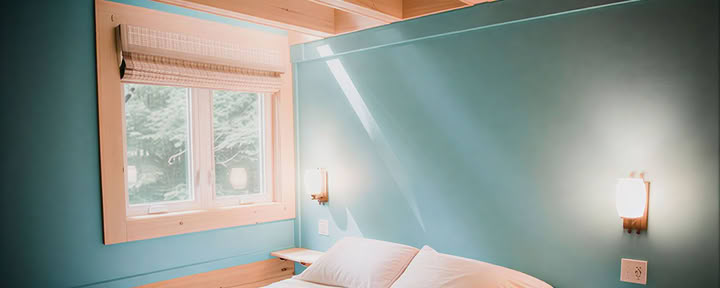 Schlafzimmer in der Blockhütte